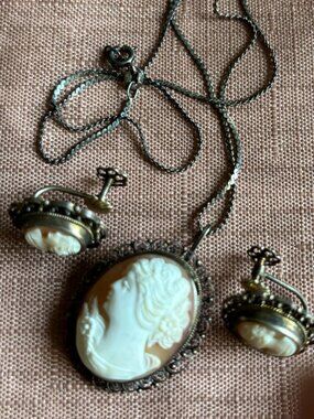 Classic three-piece cameo necklace and earrings ensemble